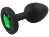 Malý anální kolík ze silikonu s tmavě zeleným šperkem
