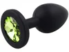 Malý anální kolík ze silikonu se světle zeleným šperkem