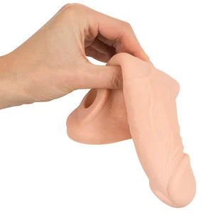 Zvětšovací návlek na penis s otvorem na varlata Nature Skin